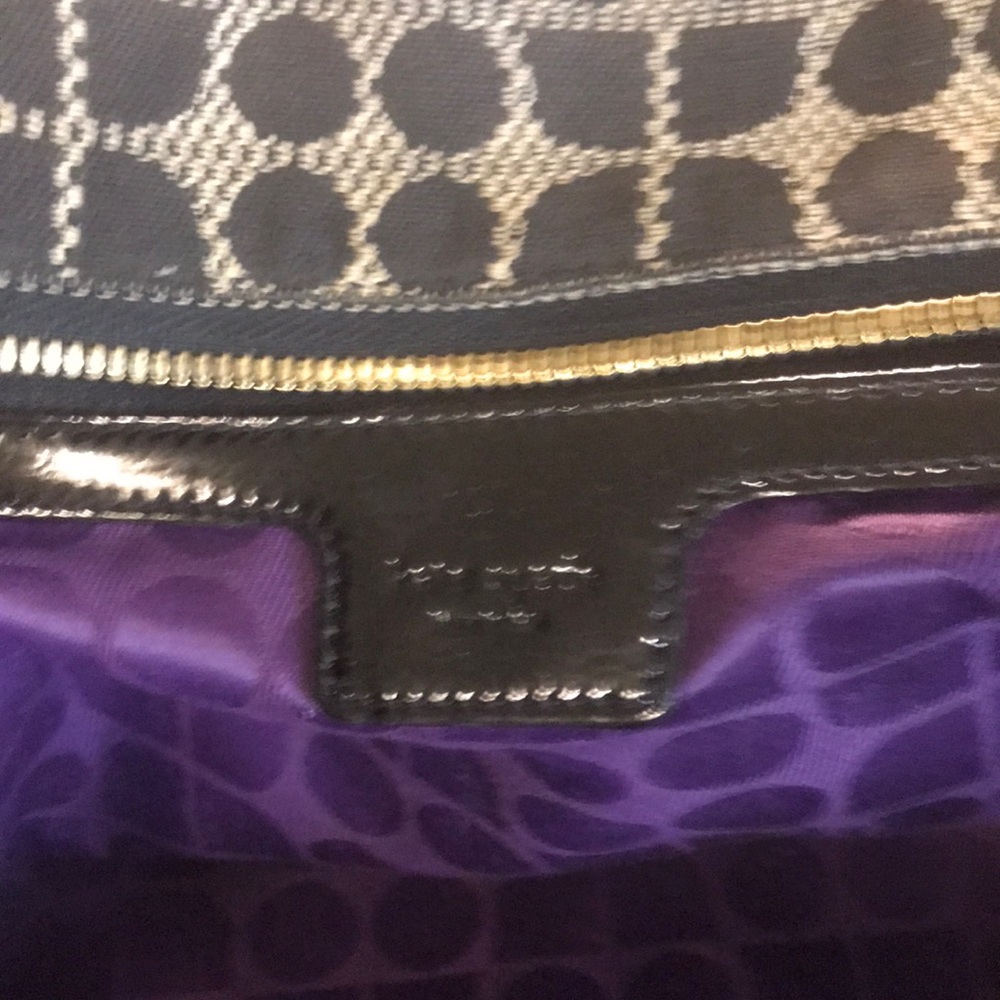 Unique Kate Spade purse! Gorgeous purple inside!!!!